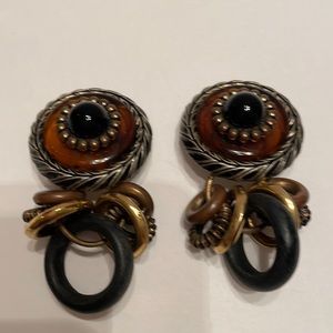 Dangling charm style earrings